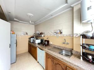 Cozy private room for couples - hosted home -not an entire apartment- Walk to Bus Station & Easy Medina Access