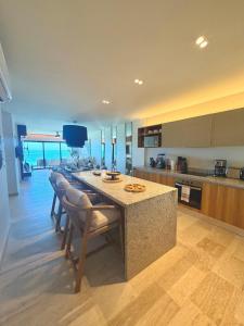 Pent-house Exclusivo frente al mar en Yucalpetén Resort Marina