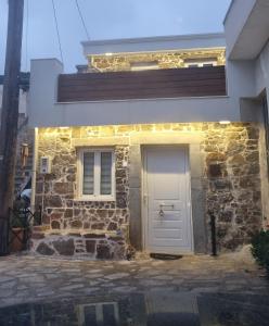 MENELAUS Stone House