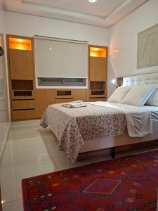 Emmraude- appartement avec 2 chambres, salon ,avec piscine 2 minutes de la plage