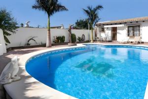 Casas con piscina compartidas Garaje y Wi-Fi