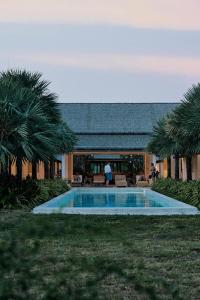 Luxury Beachfront Villa with Staff