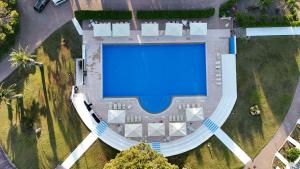 House in residence with swimming pool and tennis court