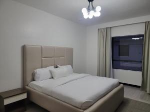 Elegant luxury three bedroom apartment with swimming pool fully equipped gym children playing ground ample parking space and amazing scenic view