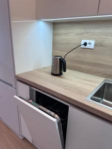 Modern Sea & City View Apartment with Parking