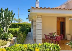 Garden Paradise near the sandy beach, parking & wifi