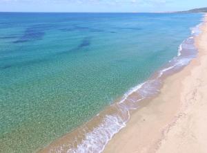 Residence with panoramic pool h24, 1500meters from the sea in Badesi