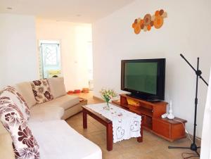 Charmant appartement à Andohanimandroseza
