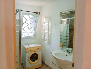 Charmant appartement à Andohanimandroseza
