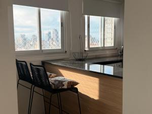 Modern apartment with balconies and open views