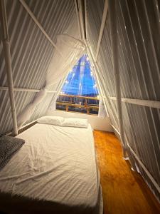 Cabaña glamping entre nubes buga