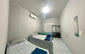 Hospedagem Trevisan casa com 3 quartos e garagem de 1 a 10 pessoas
