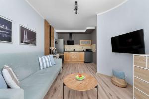 A Comfortable Apartment Near the Market Square by Noclegi Renters