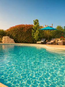 Bas de villa Lola avec piscine