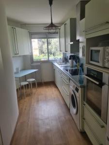 Bright apartment with garden and swimming pool