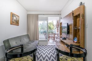 Junto à praia de Jurere, dois quartos com suite!