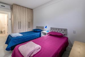 Junto à praia de Jurere, dois quartos com suite!