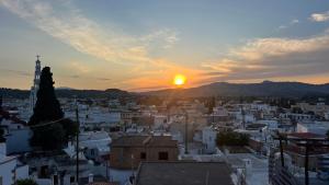 Aiora Stone Boutique House with Sunset Terrace & Mountain Views, Archangelos