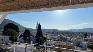 Aiora Stone Boutique House with Sunset Terrace & Mountain Views, Archangelos