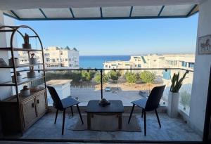 Cozy beachfront apt amazing Grin-Blu view&Barbecue