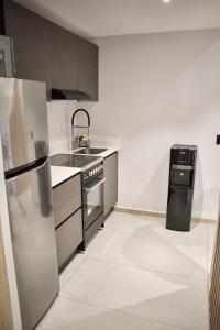 Apartment for 6 people with a pool, gym, coworking space, and parking