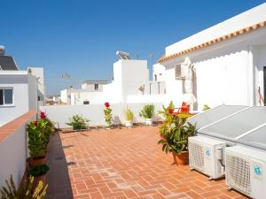 Habitacion SIN COCINA centrico con Aire acondicionado terraza azotea compartida