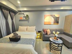 Ashleys Chamber at Soho Central across Shangrila Mall