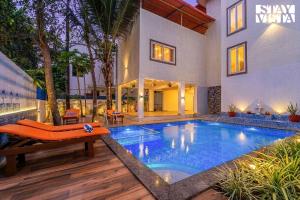 StayVista at Palmshade M2 Retreat with BBQ & TV