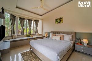 StayVista at Palmshade M2 Retreat with BBQ & TV