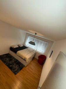 A cozy room with double bed in semi shared Flat