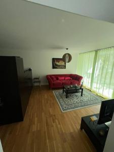 A cozy room with double bed in semi shared Flat