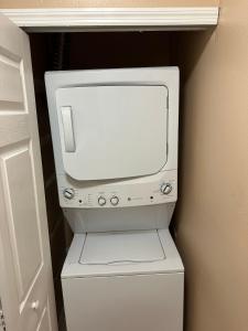 A cozy room with double bed in semi shared Flat