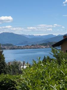 Appartamento BELLAVISTA con VISTA LAGO e GIARDINO privato