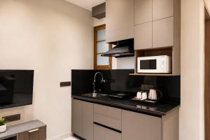 Alaya Stays Luxora Suites, Golf Course Rd near galleria