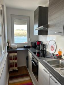 Sunny Deluxe Apartment with 2 AC and seaview - 50 m from sandy beach