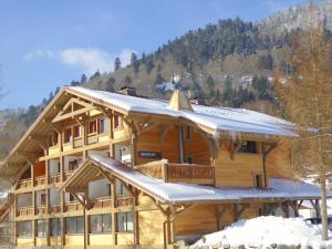 Appart'hotels Le Couaroge Chalets et Appartements : photos des chambres