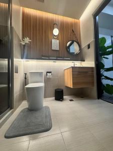 D Grey Pillows - 16th Floor One-Bedroom Condo Unit with Sea View