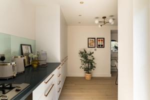 Sage Tones with Private Patio in Notting Hill