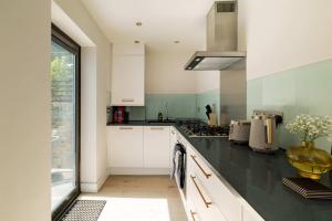 Sage Tones with Private Patio in Notting Hill