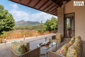 StayVista at Villa Rouge with Pool & Lawn