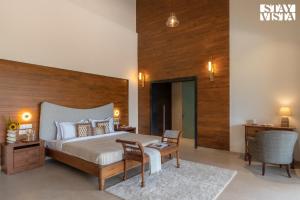 StayVista at Villa Rouge with Pool & Lawn