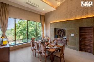 StayVista at Villa Rouge with Pool & Lawn