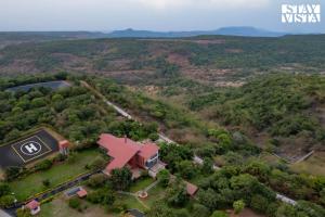 StayVista at Villa Rouge with Pool & Lawn