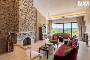 StayVista at Villa Rouge with Pool & Lawn