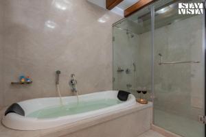 StayVista at Villa Rouge with Pool & Lawn