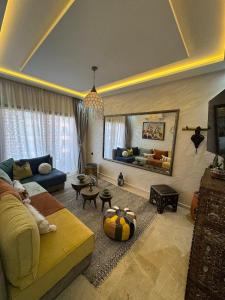 Prime location Moroccan-Style Luxury Apartment with Parking near Carré Eden Shopping Center