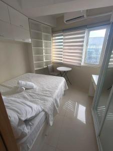 Shell Residences Deluxe by TVANS