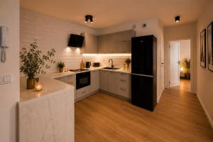 Komfortowe Apartamenty z Garażem - Łódź Fuzja Milionowa