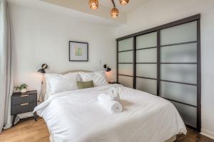 Downtown 2BR condo with city views and free parking