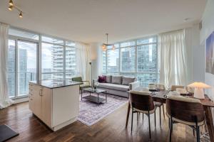 Downtown 2BR condo with city views and free parking